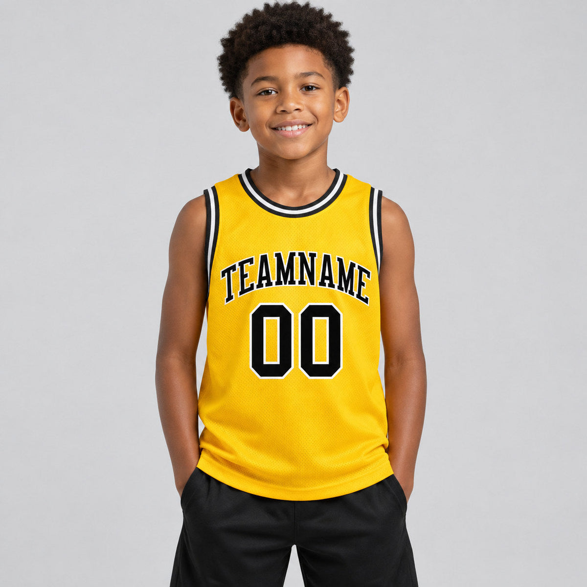 Custom Yellow Authentic Basketball Jersey with Black and White Lettering youth size worn by child model