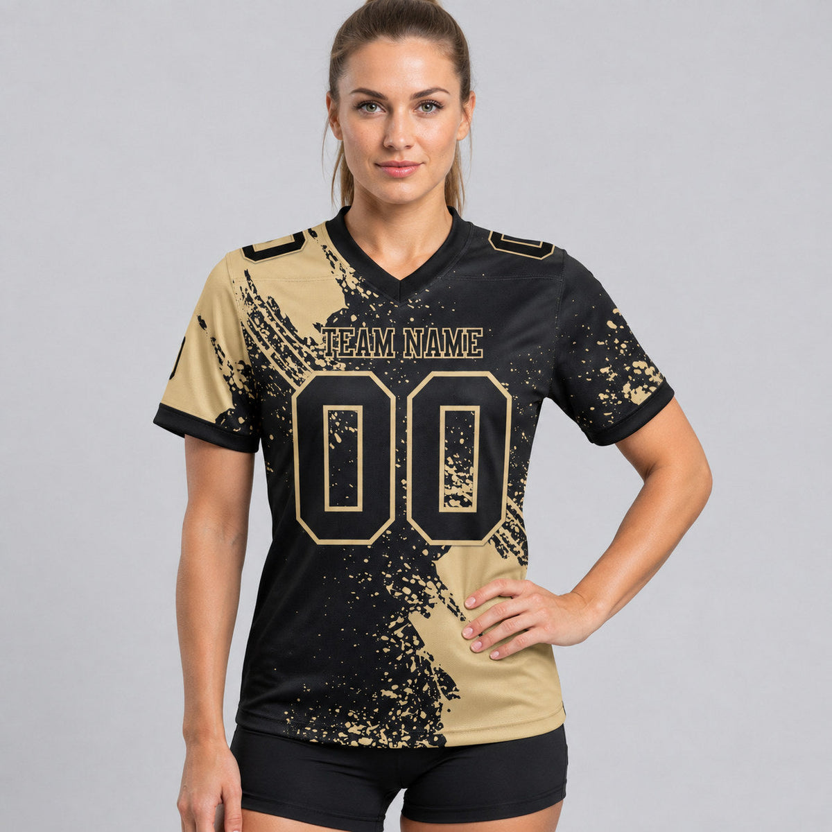 Custom Black Abstract Brush Stroke Authentic Football Jersey with Vegas Gold Lettering worn by female model