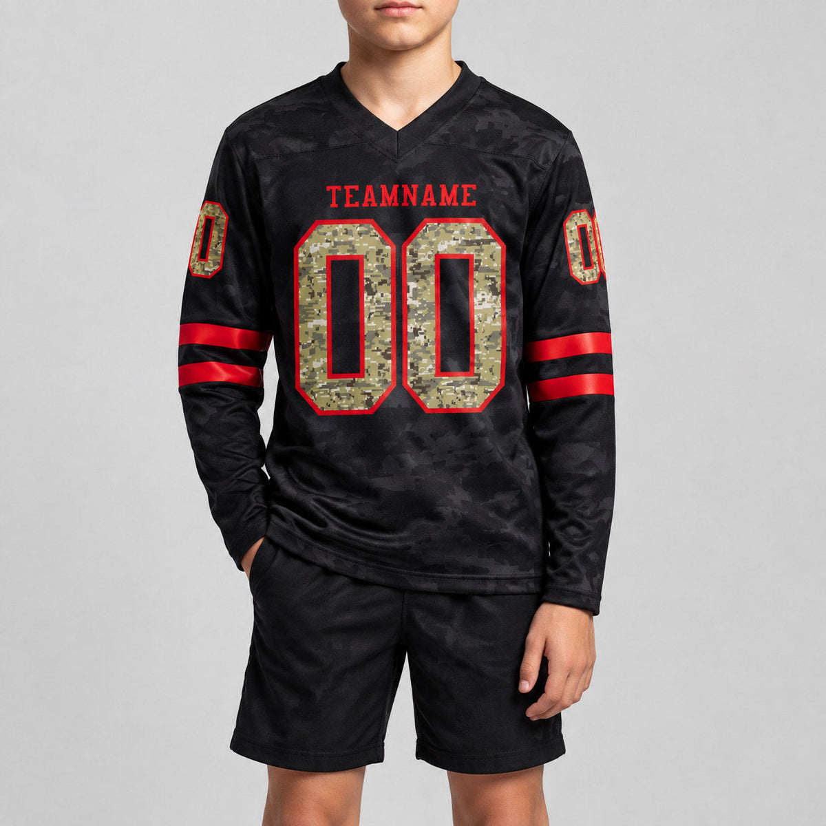 Custom Black Camo Long Sleeve Authentic Football Jersey with Red Lettering youth size worn by child model