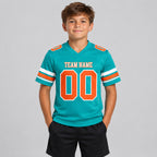 Custom Aqua Authentic Football Jersey with Orange and White Lettering youth size worn by child model