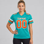 Custom Aqua Authentic Football Jersey with Orange and White Lettering worn by female model