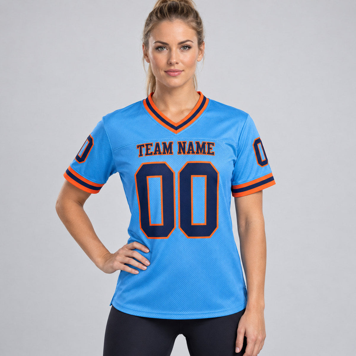 Custom Powder Blue Mesh Authentic Football Jersey with Navy and Orange Lettering worn by female model