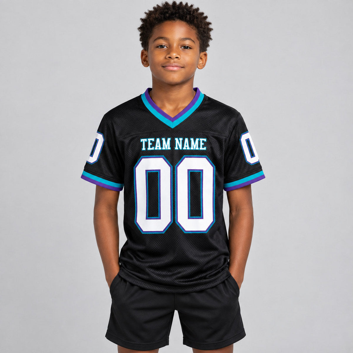 Custom Black Mesh Authentic Football Jersey with Purple and Teal Lettering youth size worn by child model
