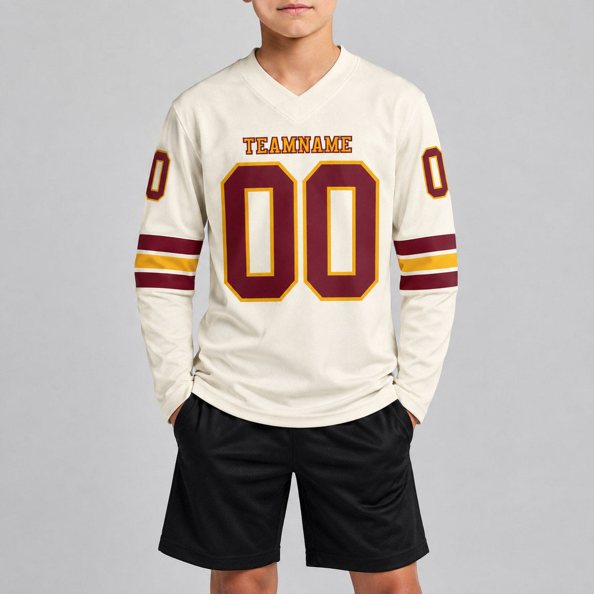 Custom Cream Long Sleeve Authentic Football Jersey with Burgundy and Gold Lettering youth size worn by child model