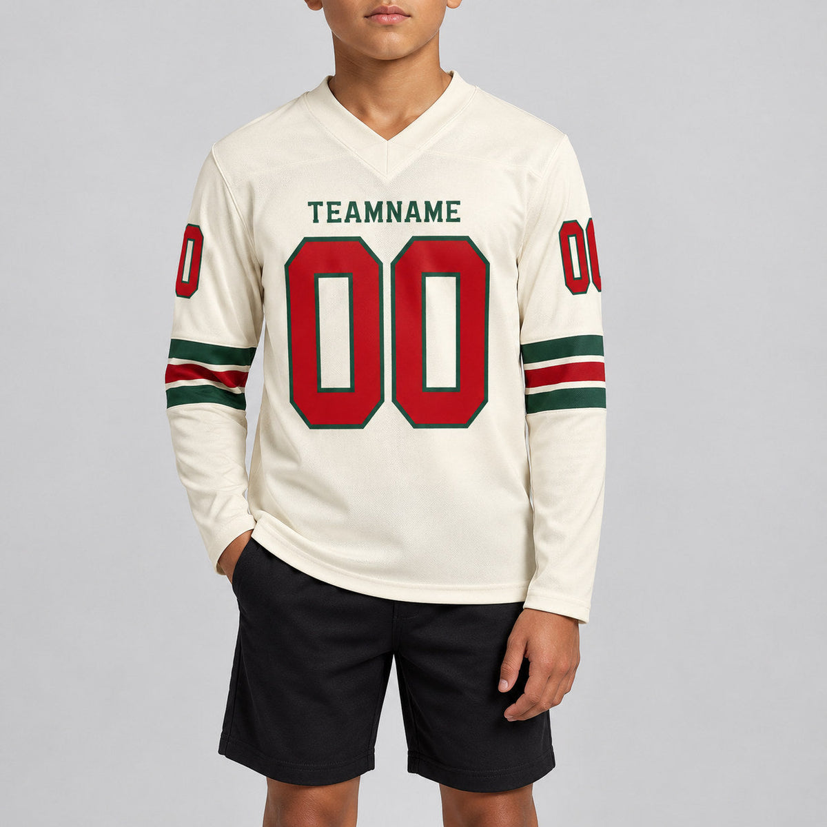Custom Cream Long Sleeve Authentic Football Jersey with Red and Green Lettering youth size worn by child model