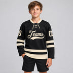 Custom Black Lace Neck Hockey Jersey with Cream Lettering youth size worn by child model