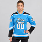 Custom Sky Blue Lace Neck Hockey Jersey with White and Black Lettering worn by female model