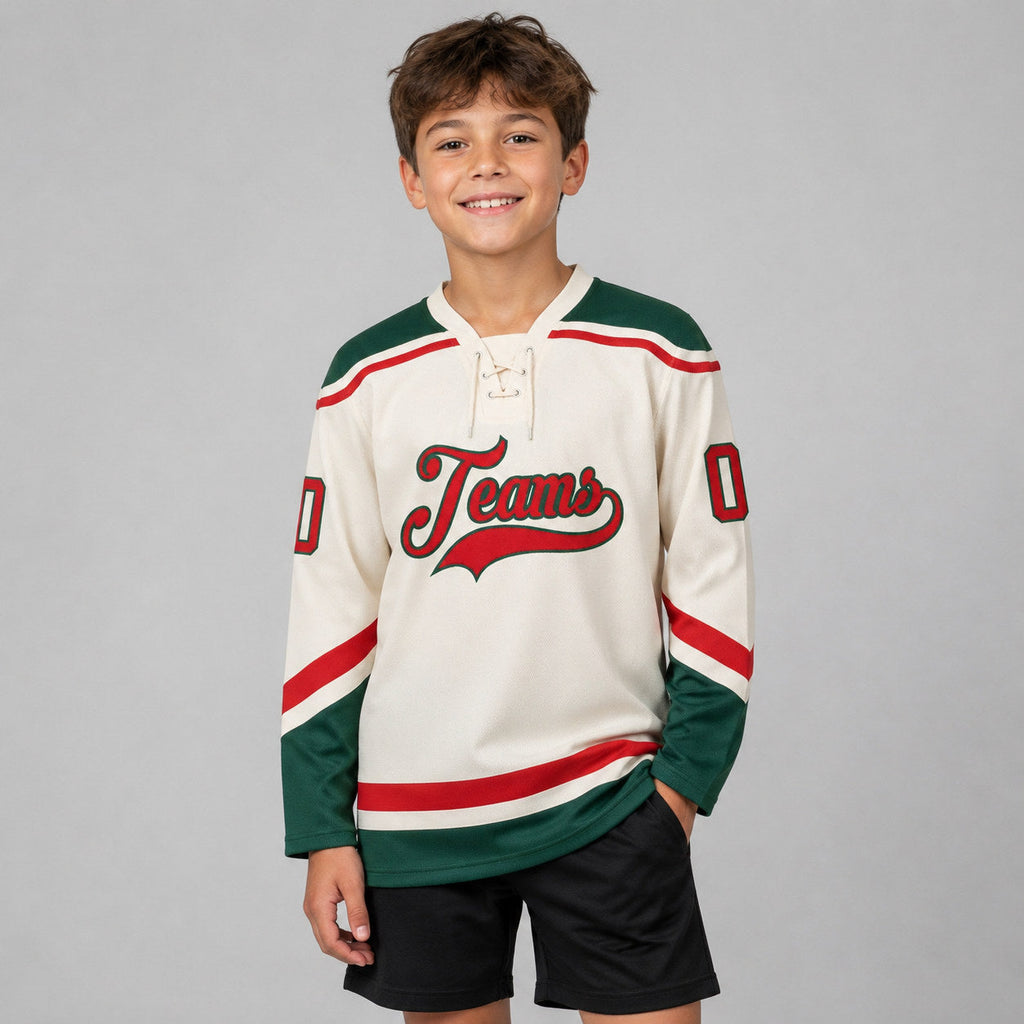 Custom Cream Lace Neck Hockey Jersey with Red and Green Lettering Design 0566 youth size worn by child model