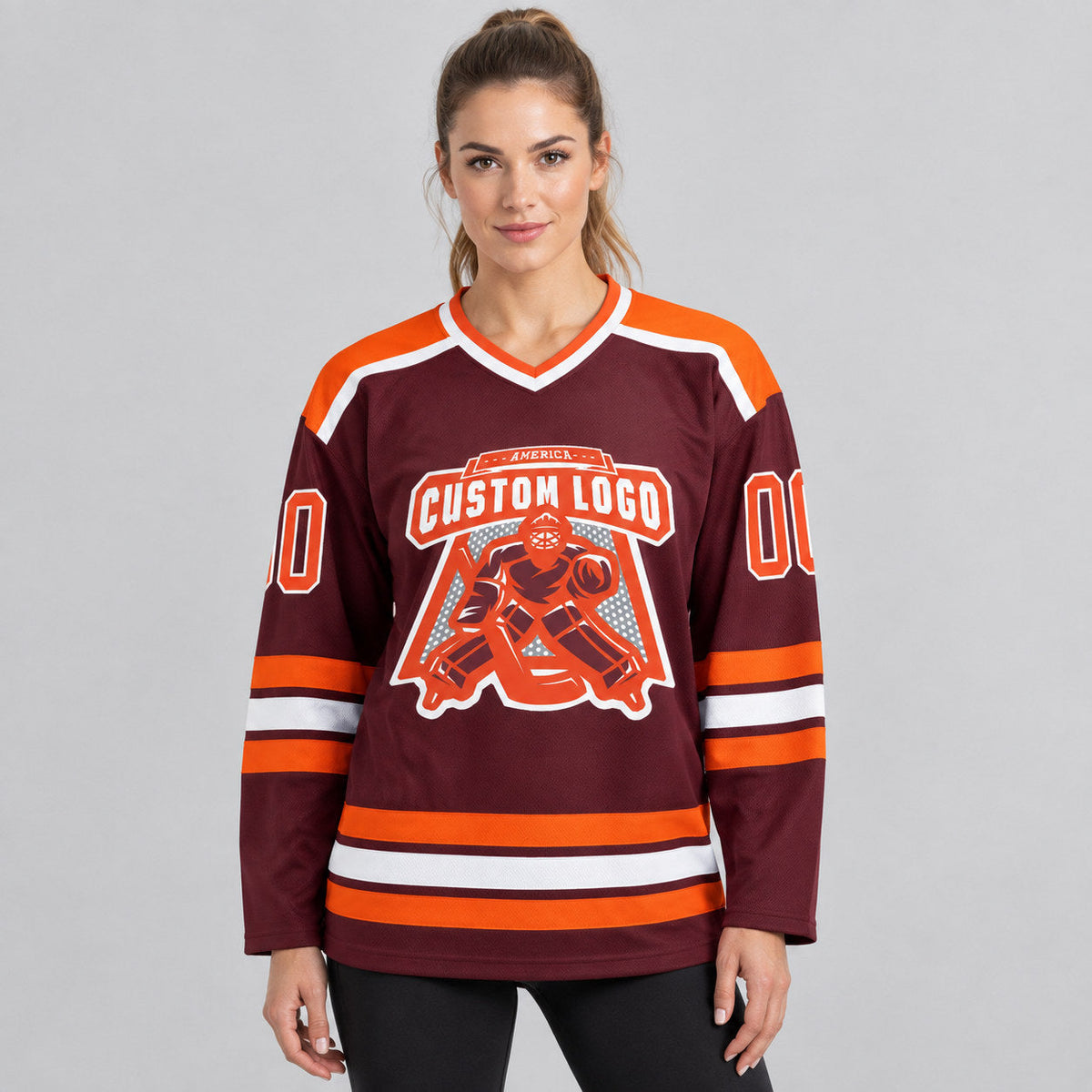 Custom Burgundy Hockey Jersey with Orange and White Lettering worn by female model