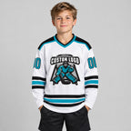 Custom White Hockey Jersey with Aqua and Black Lettering Design 1060 youth size worn by child model