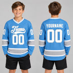 Custom Light Blue Hockey Jersey with White and Gray Lettering Design 0201 youth size worn by child model