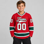 Custom Red Hockey Jersey with White and Green Lettering Design 0331 youth size worn by child model