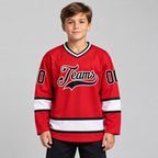 Custom Red Hockey Jersey with Black and White Lettering Design 0328 youth size worn by child model