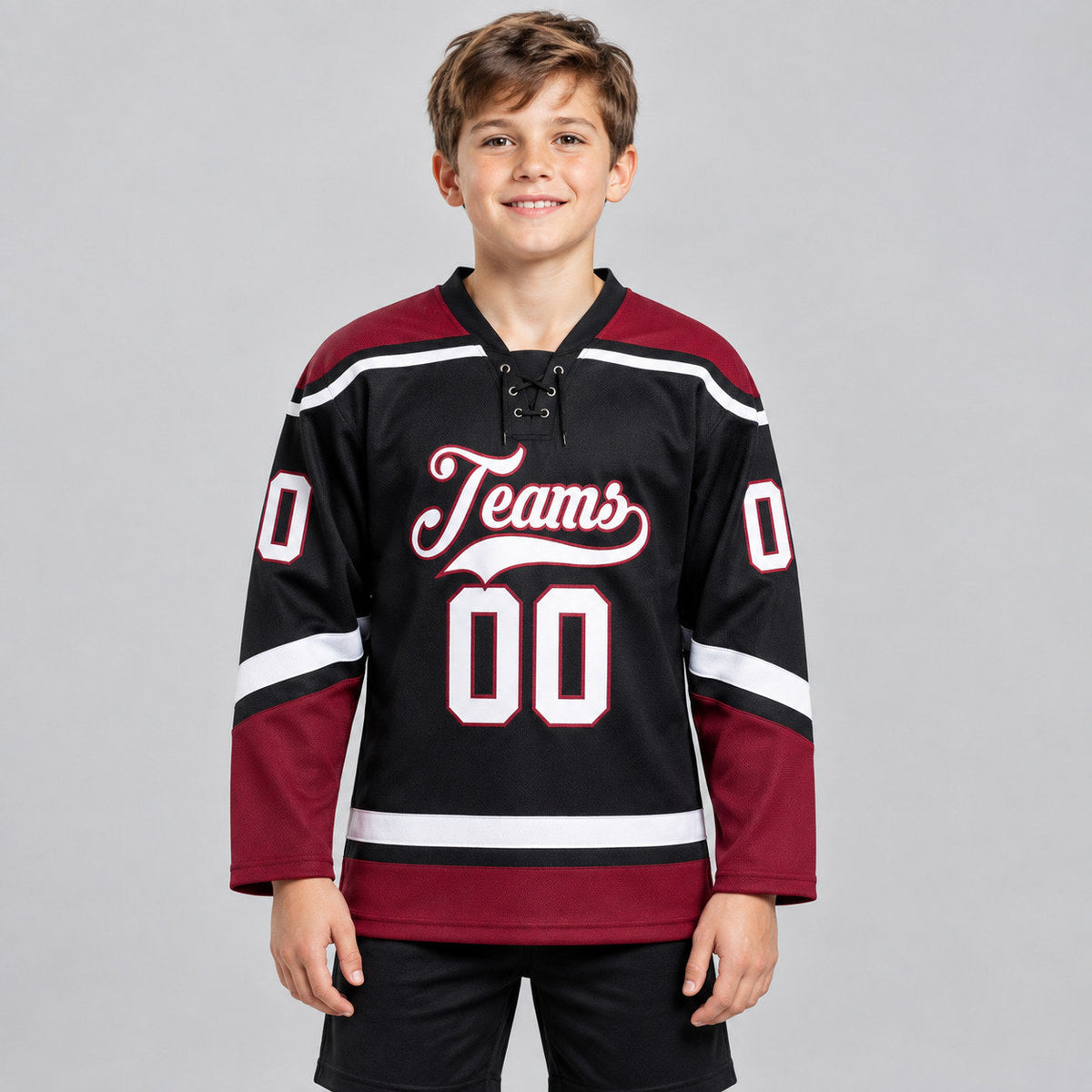 Custom Black Lace Neck Hockey Jersey with White and Crimson Lettering youth size worn by child model