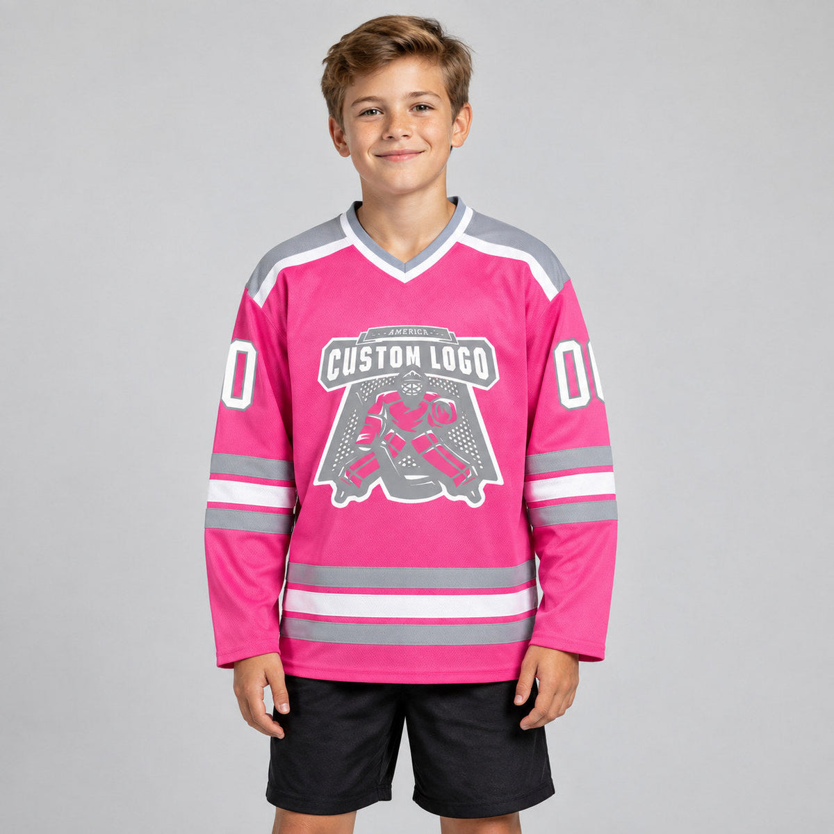Custom Pink Hockey Jersey with White and Gray Lettering Design 0163 youth size worn by child model