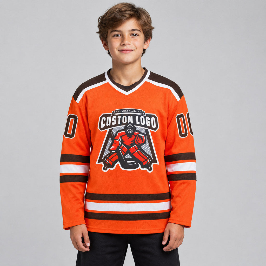 Custom Orange Hockey Jersey with Brown and White Lettering youth size worn by child model