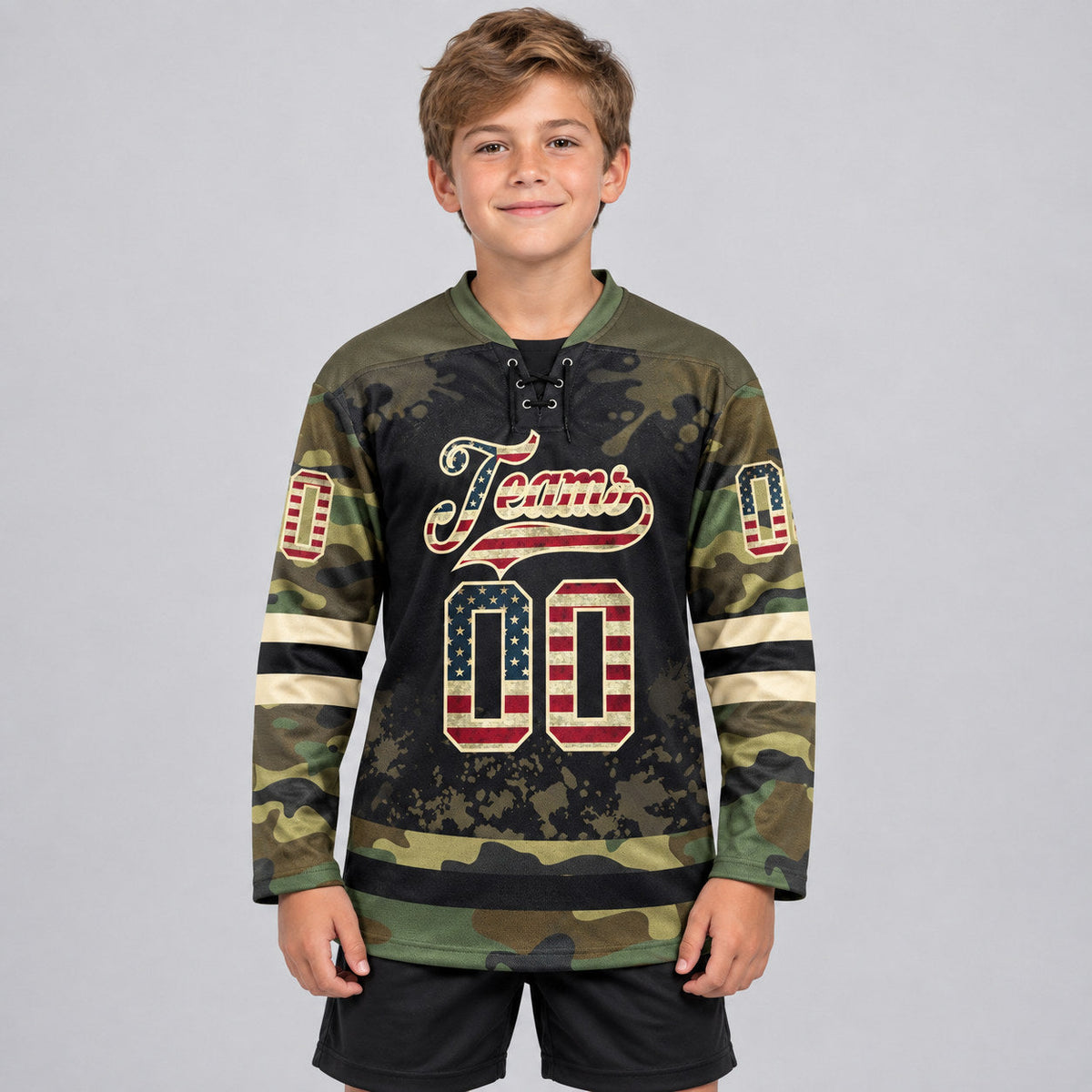 Custom Olive Camo Vintage USA Flag Splash Lace Neck Hockey Jersey with Black and Cream Lettering youth size worn by child model