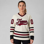 Custom Cream Hockey Jersey with Maroon and Black Lettering worn by female model