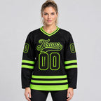 Custom Black Hockey Jersey with Neon Green Lettering Design 2478 worn by female model