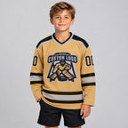 Custom Old Gold Hockey Jersey with Black and Gray Lettering Design 0037 youth size worn by child model
