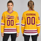 Custom Gold Hockey Jersey with Maroon and White Lettering Design 0167 worn by female model
