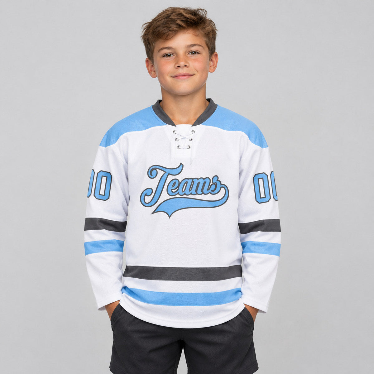 Custom White Lace Neck Hockey Jersey with Light Blue and Steel Gray Lettering Design 1938 youth size worn by child model