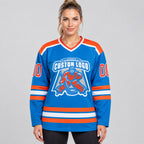 Custom Blue Hockey Jersey with Orange and White Lettering worn by female model