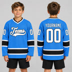Custom Powder Blue Hockey Jersey with White and Black Lettering youth size worn by child model