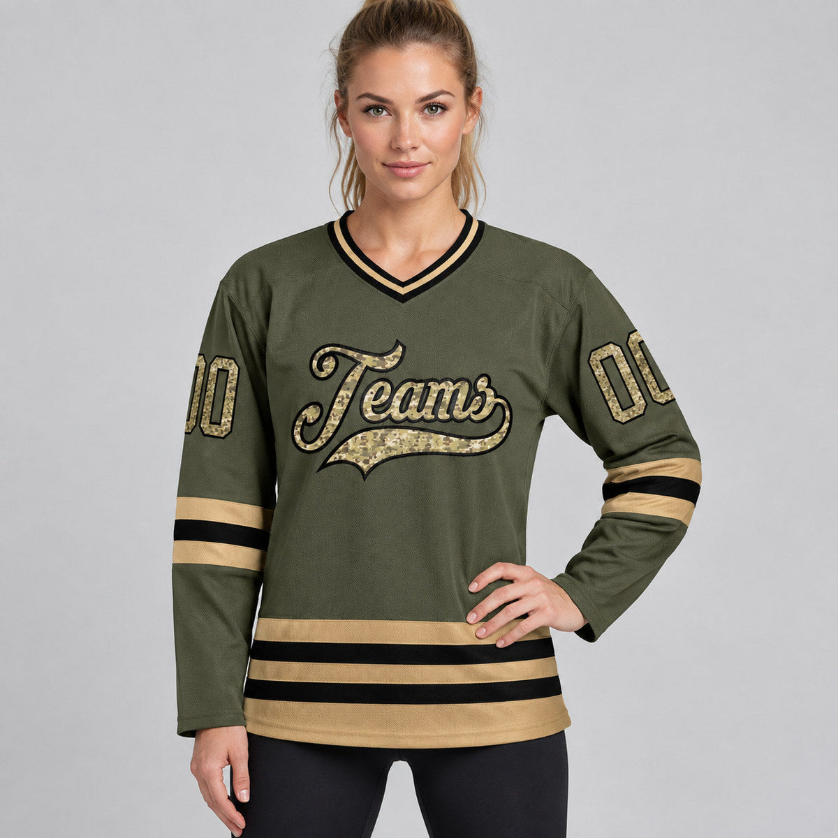 Custom Olive Camo Salute To Service Hockey Jersey with Old Gold Lettering worn by female model