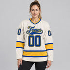 Custom Cream Hockey Jersey with Royal and Gold Lettering Design 0154 worn by female model