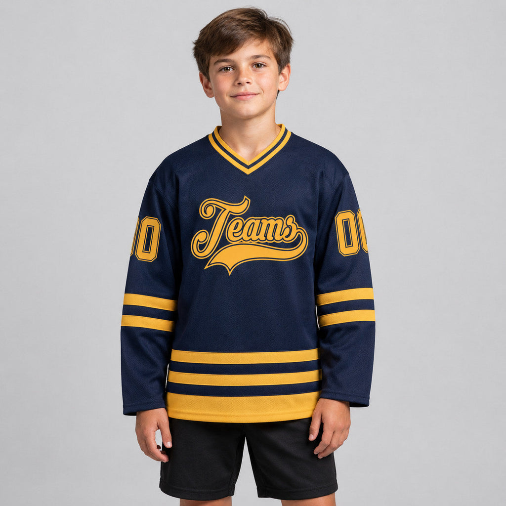 Custom Navy Hockey Jersey with Old Gold Lettering youth size worn by child model