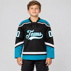 Custom Black Lace Neck Hockey Jersey with White and Teal Lettering youth size worn by child model