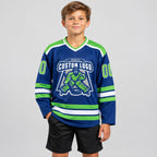 Custom Royal Hockey Jersey with Neon Green and White Lettering youth size worn by child model