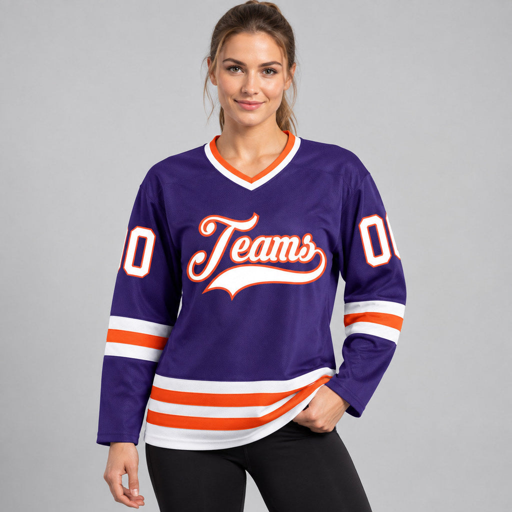 Custom Purple Hockey Jersey with White and Orange Lettering worn by female model