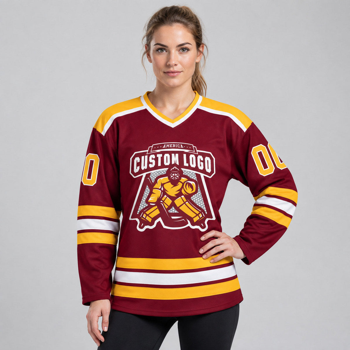 Custom Maroon Hockey Jersey with Gold and White Lettering worn by female model