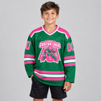 Custom Kelly Green Hockey Jersey with Pink and White Lettering Design 0285 youth size worn by child model