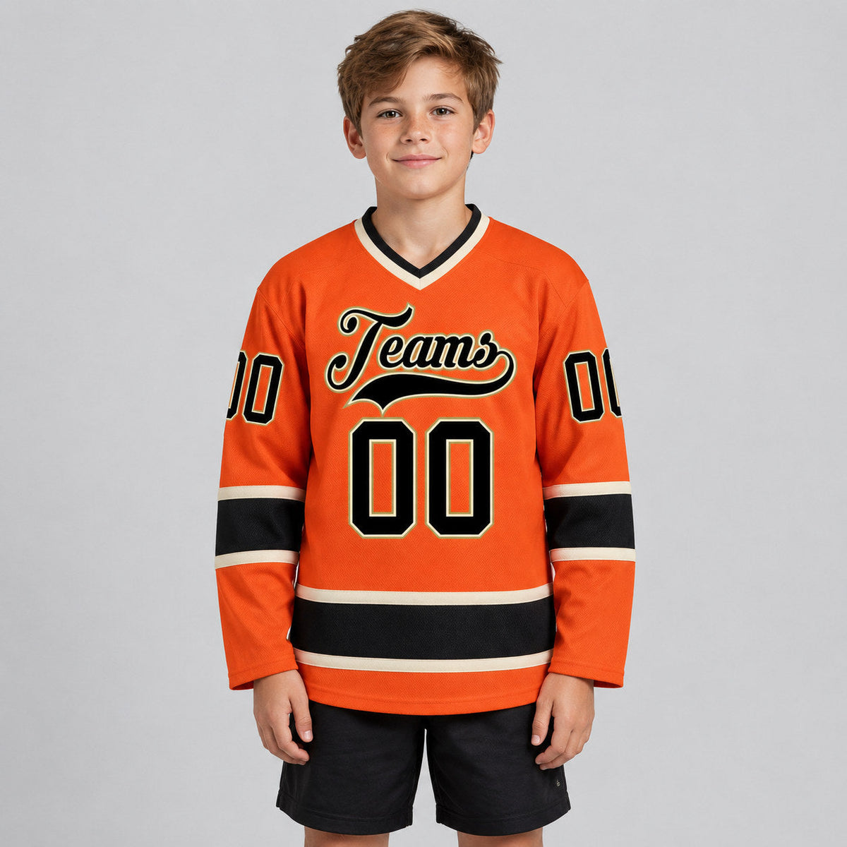 Custom Orange Hockey Jersey with Black and Cream Lettering youth size worn by child model