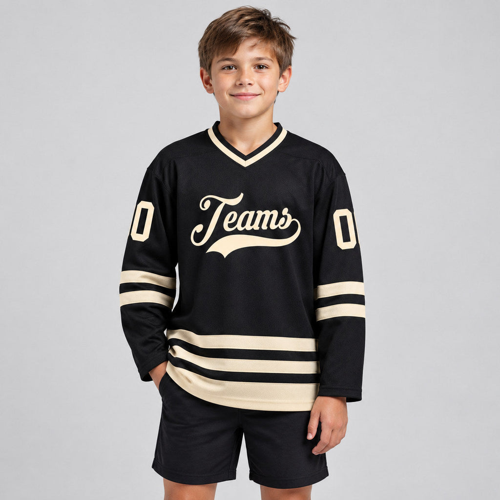 Custom Black Hockey Jersey with Cream Lettering youth size worn by child model