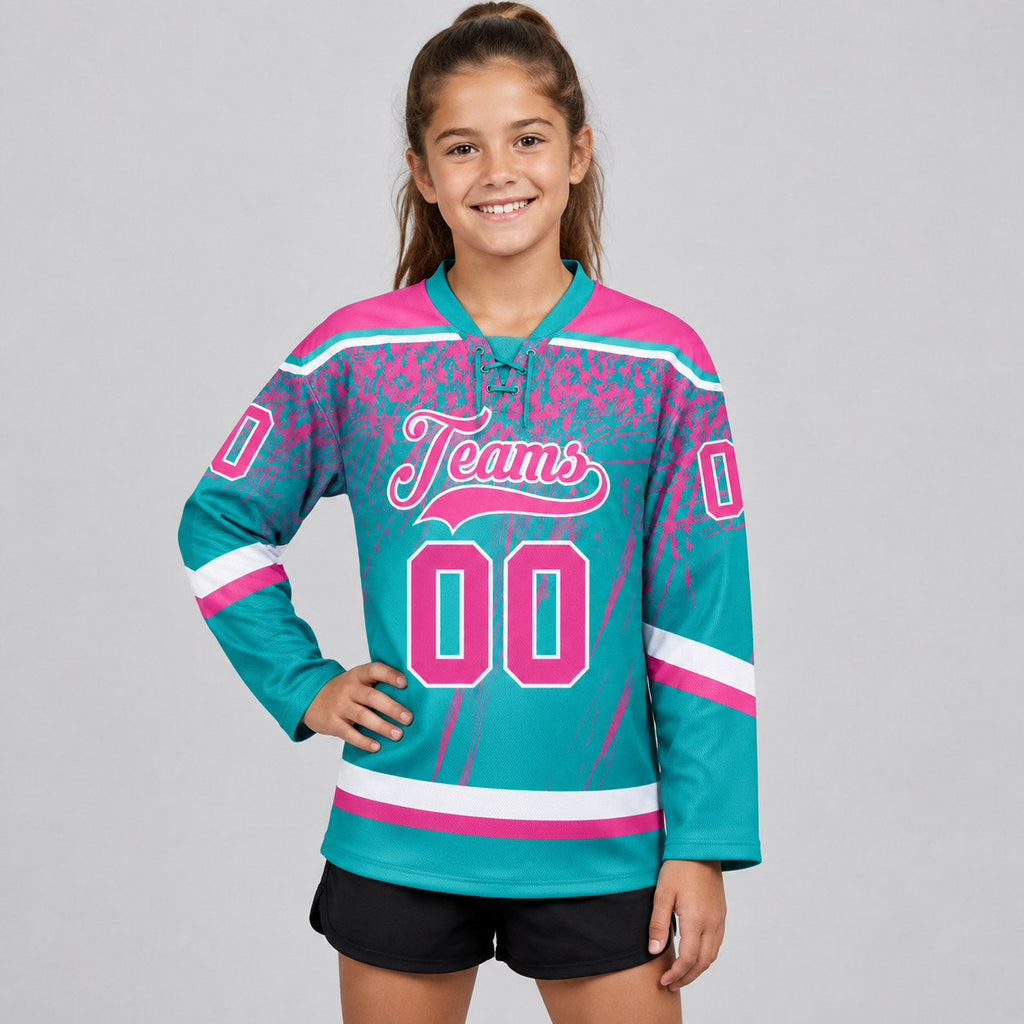 Custom Aqua Splash Lace Neck Hockey Jersey with Pink and White Lettering youth size worn by child model