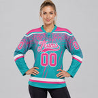 Custom Aqua Splash Lace Neck Hockey Jersey with Pink and White Lettering worn by female model