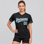 Custom Black Two Button Softball Jersey with White and Teal Lettering worn by female model
