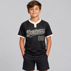 Custom Black Two Button Softball Jersey with Black and Cream Lettering youth size worn by child model