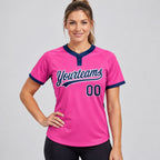 Custom Pink Two Button Softball Jersey with Navy and White Lettering worn by female model