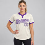 Custom Cream Two Button Softball Jersey with Gray and Purple Lettering worn by female model