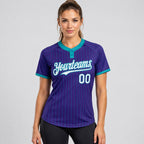 Custom Purple Two Button Pinstripe Softball Jersey with Teal Lettering worn by female model