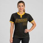 Custom Black Two Button Pinstripe Softball Jersey with Gold Lettering Design 0892 worn by female model