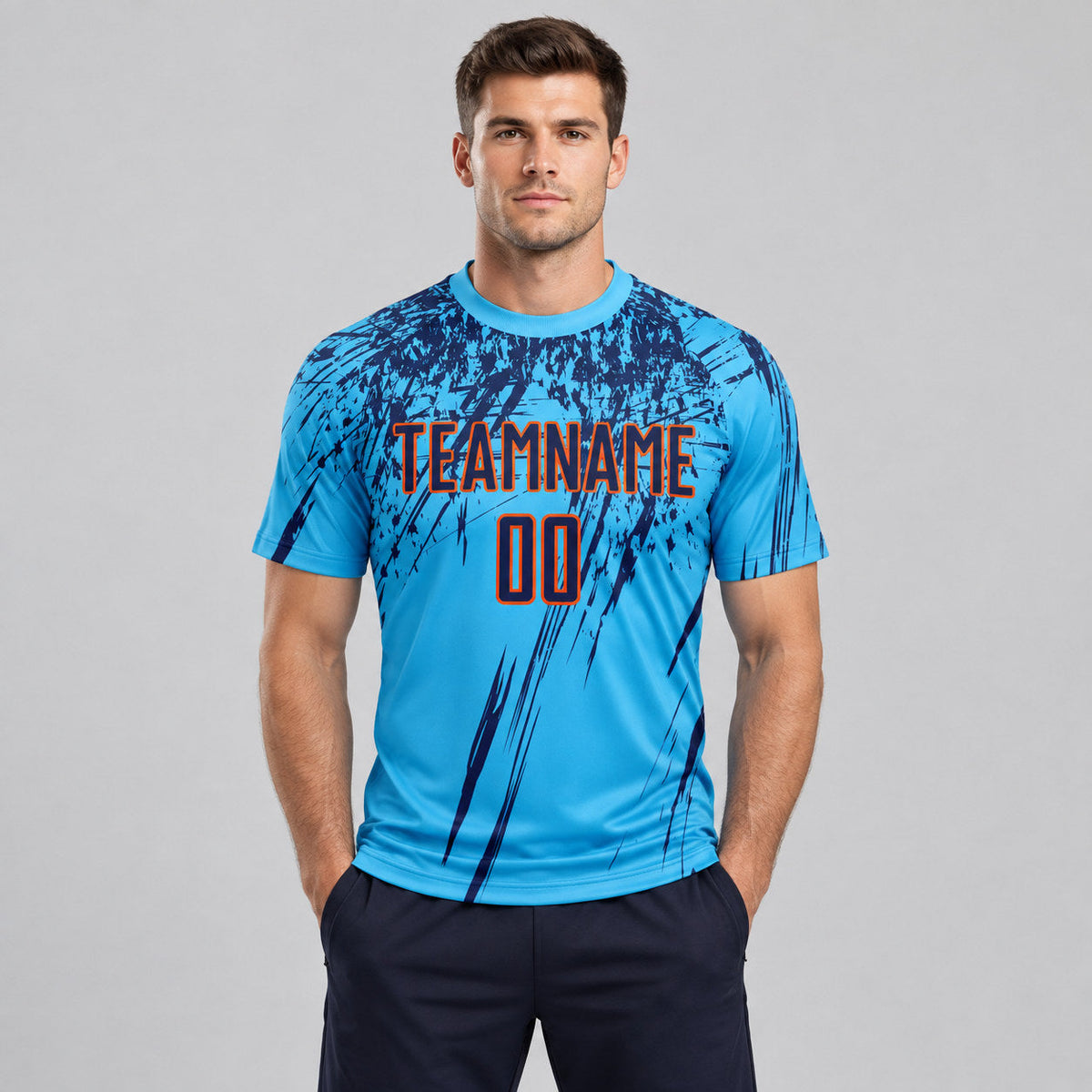 Custom Sky Blue Sublimated Soccer Jersey with Navy and Orange Lettering worn by male model