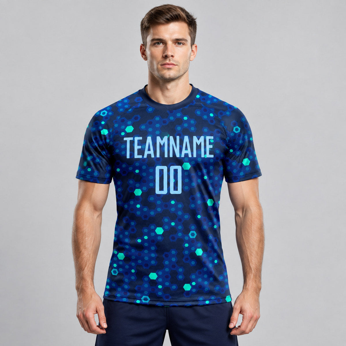 Custom Navy Sublimated Soccer Jersey with Light Blue and Royal Lettering worn by male model