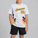 Custom White and Yellow and Red Germany Geometric Soccer T-Shirt with Gray and Black Lettering youth size worn by child model