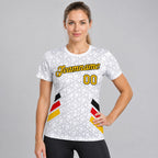 Custom White and Yellow and Red Germany Geometric Soccer T-Shirt with Gray and Black Lettering worn by female model